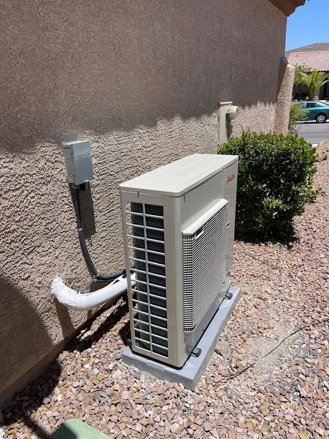 Residential air conditioning condenser unit in Lenox